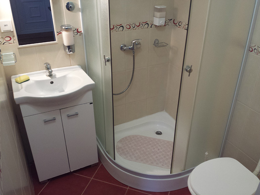 Private bathroom inside a studio apartment in Subotica