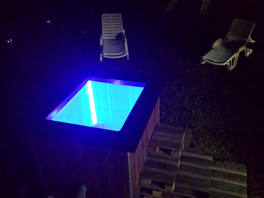 Couples wood-fired hot tub experience at night in Subotica, Serbia