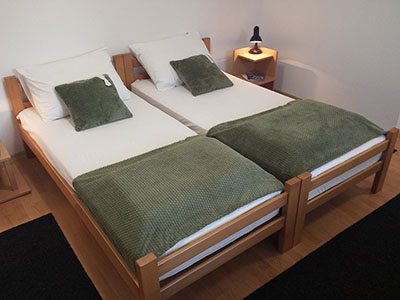 Bedroom area in a private studio apartment in Subotica
